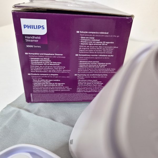 Die Kartonseite mit der Produktbeschreibung, unter anderem auf Deutsch.